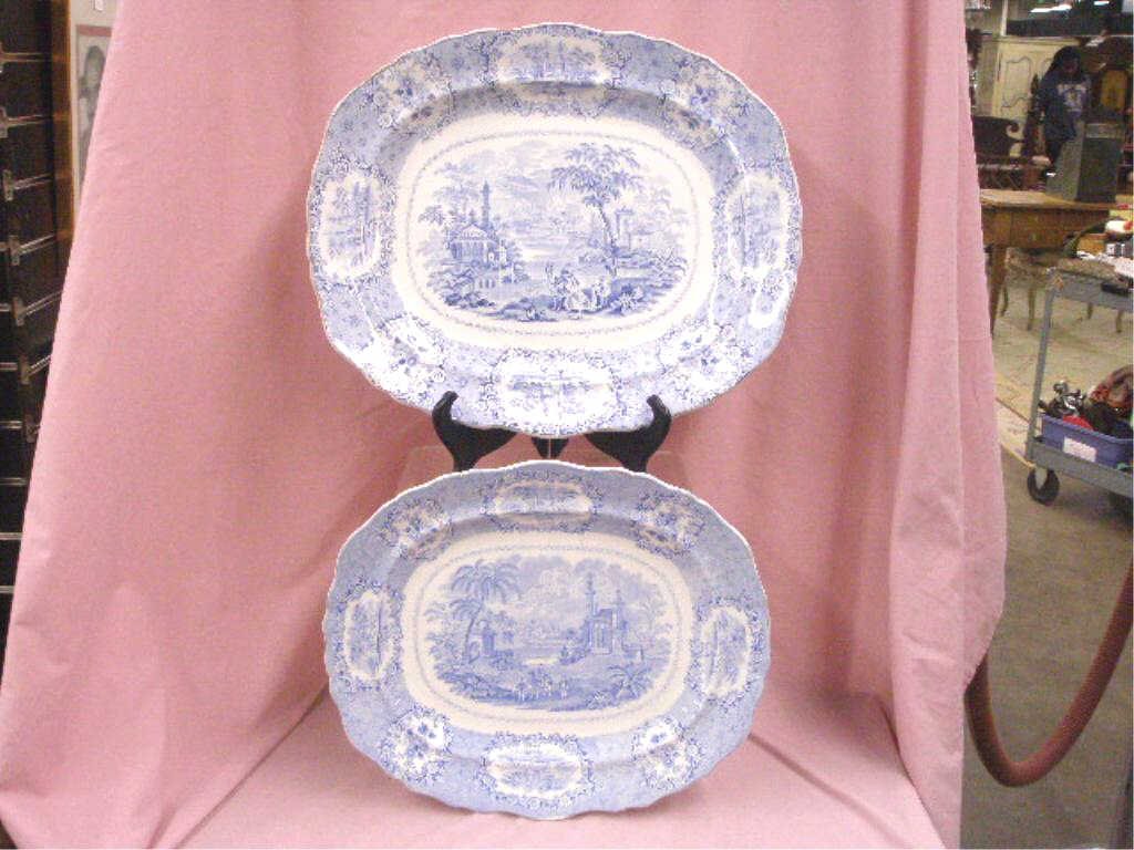 Ridgways Oriental Pattern Ironstone Platters: Late 19th c. Ridgway Potteries Ltd., English blue and white transferware Oriental pattern 17 1/4" and 19 1/8" Ironstone oval serving platters. CONDITION: Both are very good with minor wear and no dama