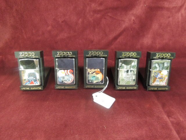 5 Zippo Lighters Big Rig: Five Zippo lighters - Big Rig including: (4) chrome color lighters, Knight Rebel, Road Freedom, Road Winder, American Spirit & (1) Chrome Knight Rebel (etched) new old stock in original black plastic 