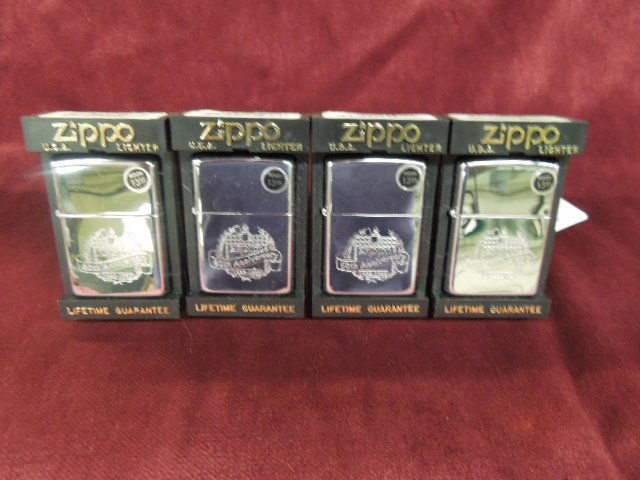 4 Zippo Lighters "60" Anniversary: Four Zippo lighters - "60th" anniversary, chrome etched model #250 526 (bottom sticker), new old stock in plastic flip front Zippo cases. CONDITION: New old stock.