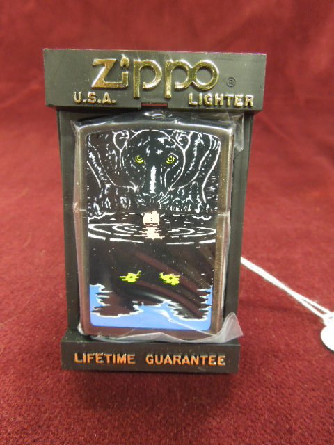 Zippo Lighter "Black Leopard": Zippo lighter - "Black Leopard", front & backside, 90's, Barrett - Smythe collection, new old stock in plastic bag with plastic flip front Zippo case. CONDITION: New old stock.