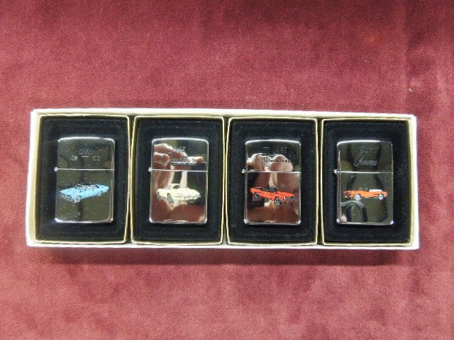 Set of 4 Zippo Lighters "The Super 60's": Set of 4 Zippo lighters "The Super 60's", new old stock in fitted cardboard cases with plastic sleeve including; 1964 GTO, 1965 Corvette Stingray, 1965 Mustang and 1967 Camaro.