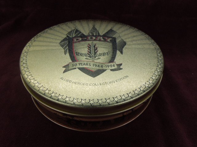 Zippo Lighter Collectors Set - D Day: Zippo lighter collectors set; D-Day Normandy 50 years, 1944-1994, Allied Heroes collectors edition featuring (4) brass lighters (Generals) and (1) key chain in fitted round tin.