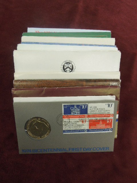 12 Mint Sets Each with D&P Mints 70's - 90's: 1- Mint Sets each with D&P mints, 1974, 1984, 1985, 1986, 1987, 1988, 1989, 1990, 1991, 1992, 1993, 1994, and Bicentennial 1st Day Cover with medal. CONDITION: No issues noted.