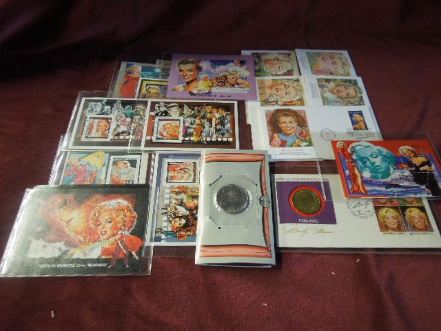 Marilyn Monroe stamps/coins/1st day covers: Lot - Marilyn Monroe stamps, coins and first day covers including; (2) Mashall Islands coins, $5 + $10 ($10 w/ 1st day cover), (5) June 1st, 1995 , 32c first day covers, (11) Mongolia, Burkina Fasc, C