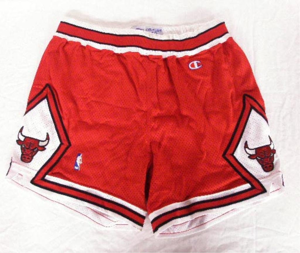 1990's Chicago Bulls Shorts: 1990's Champion brand Chicago Bulls shorts, size 42. CONDITION: Very good with no damage, areas with dirt stains.