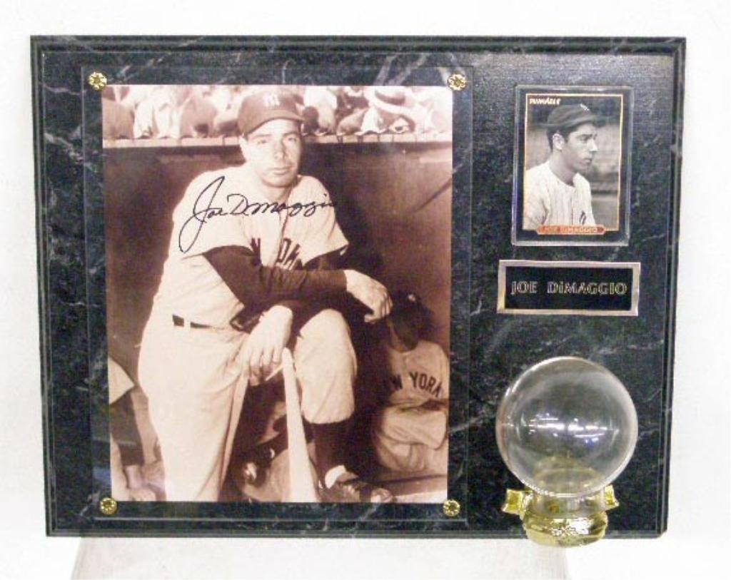 Joe DiMaggio Signed Photograph Display: Joe DiMaggio signed 8" x 10" black & white photograph 14 3/4" x 12" display plaque with Pinnacle Baseball card & Baseball holder, no C.O.A. for authenticity or guarantee of signature. CONDITION: Loss 