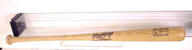 Cal Ripken Jr. Signed Baseball Bat: Cal Ripken Jr. signed Rawlings Big Stick Professional Model 33" Baseball bat with bat holder, no C.O.A. for authenticity or guarantee of signature. CONDITION: Very good with strong signature.