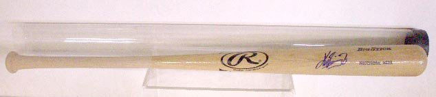 Ken Griffey Jr. Signed Baseball Bat: Ken Griffey Jr. signed Rawlings Big Stick Professional Model 33" Baseball bat with bat tube holder, no C.O.A. for authenticity or guarantee of signature. CONDITION: Very good with strong signature.