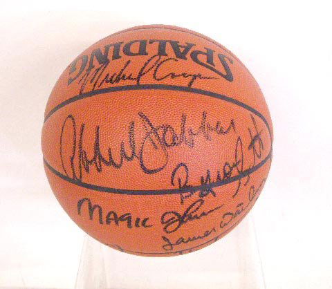 Los Angeles Lakers Signed Basketball: Los Angeles Lakers team signed Spalding Basketball, includes: (Kareem) Abdul Jabbar, Magic Johnson, Jamal Wilkes, Michael Cooper, Byron Scott, A. C. Green & Kurt Rambis, also includes Jerry West signa