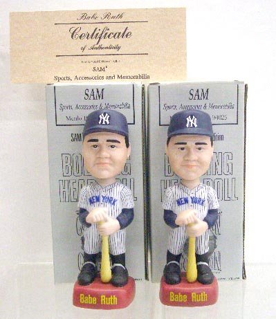 SAM Inc. Babe Ruth Bobble Head Dolls: Two 1992 SAM, Inc. hand painted porcelain Babe Ruth bobble head dolls, with boxes, limited edition of 3,000 made. CONDITION: Both are very good with no damage, boxes have wear.
