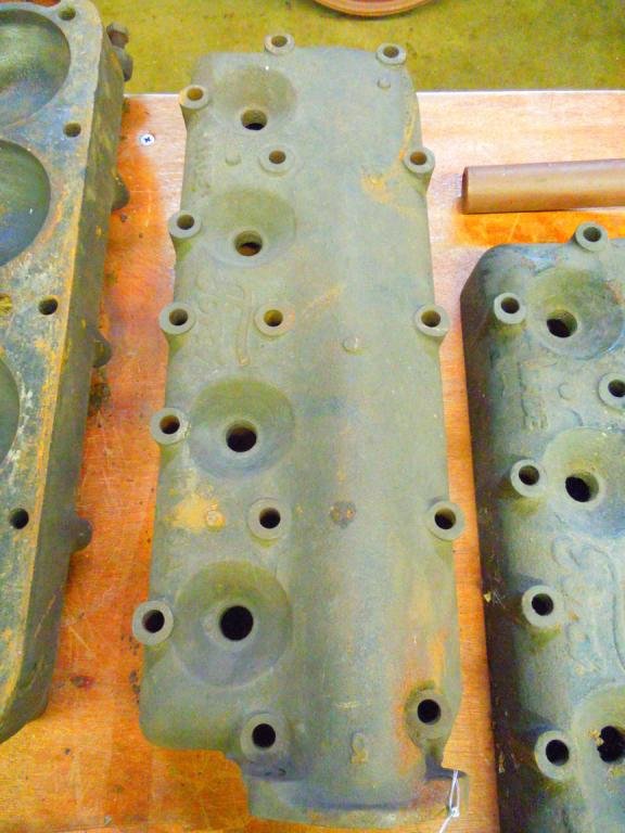 Model-T Ford Cast Iron Cylinder Head.: Model-T Ford Cast Iron Cylinder Head. Condition: Used, Not sure of cracks, will need work.