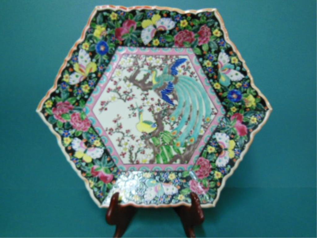 Chinese Famille Noir Porcelain Charger: Chinese Famille Noir porcelain charger 6 sided with floral and butterfly border, bird and floral center, mark on reverse, 18"w, early 20th c. CONDITON: No issues noted.