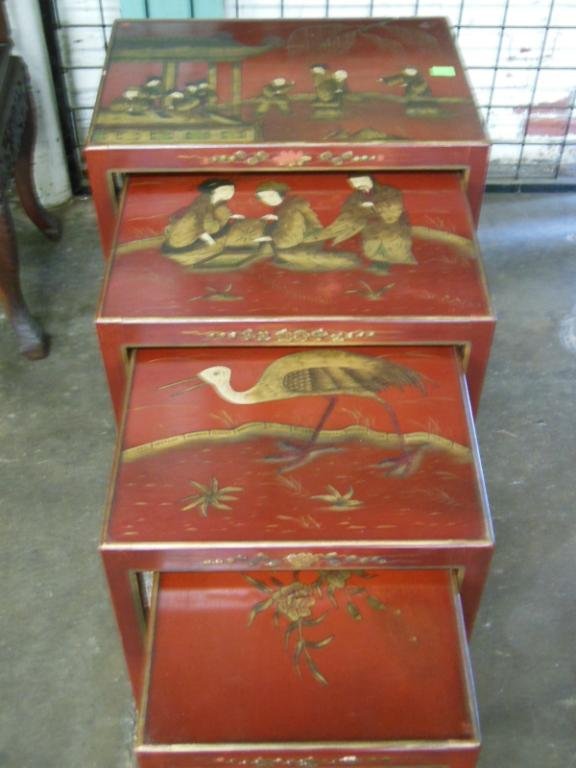 Chinese Nest of 4 Tables: Chinese nest of 4 tables, red lacqured with polychromed life & nature scenes, 20th c. CONDITION: Minor paint losses & wear.