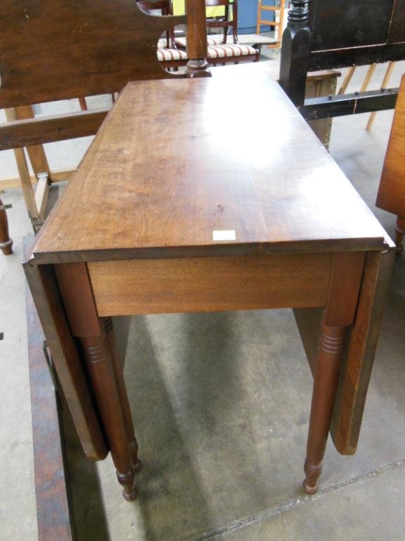Country Sheraton 6 Leg Drop Leaf Table: Country Sheraton 6 leg drop leaf table, walnut, 19th C., length 44". CONDITION: No issues identified.