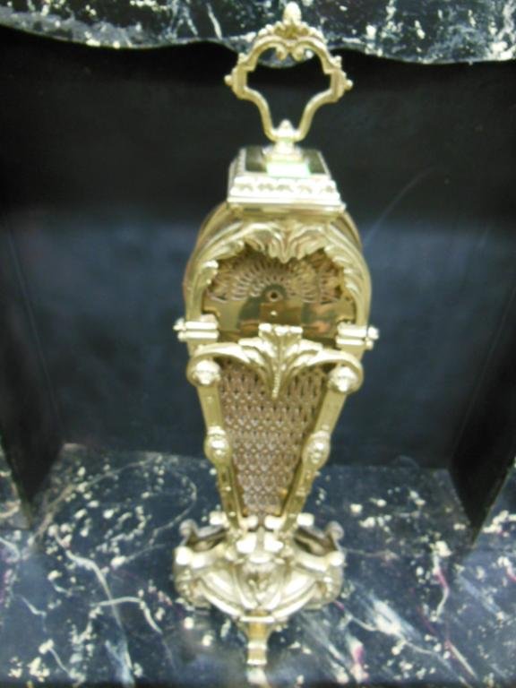 Brass Fireplace Fan: Brass fireplace fan with cast rosettes & plumes, 20th c. CONDITION: No issues noted.