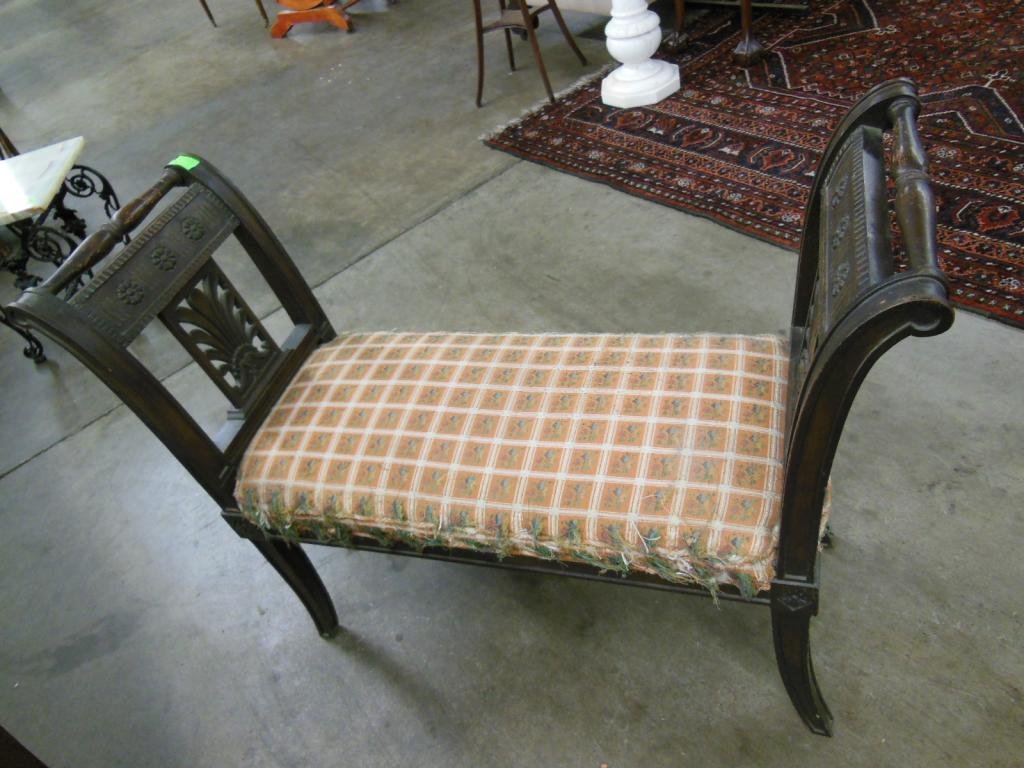 Fireside Bench: Fireside bench, stylized mahogany, with rail, rosette & plume carved ends, mid 20th c. length 36". CONDITION: Finish losses, upholstery worn.