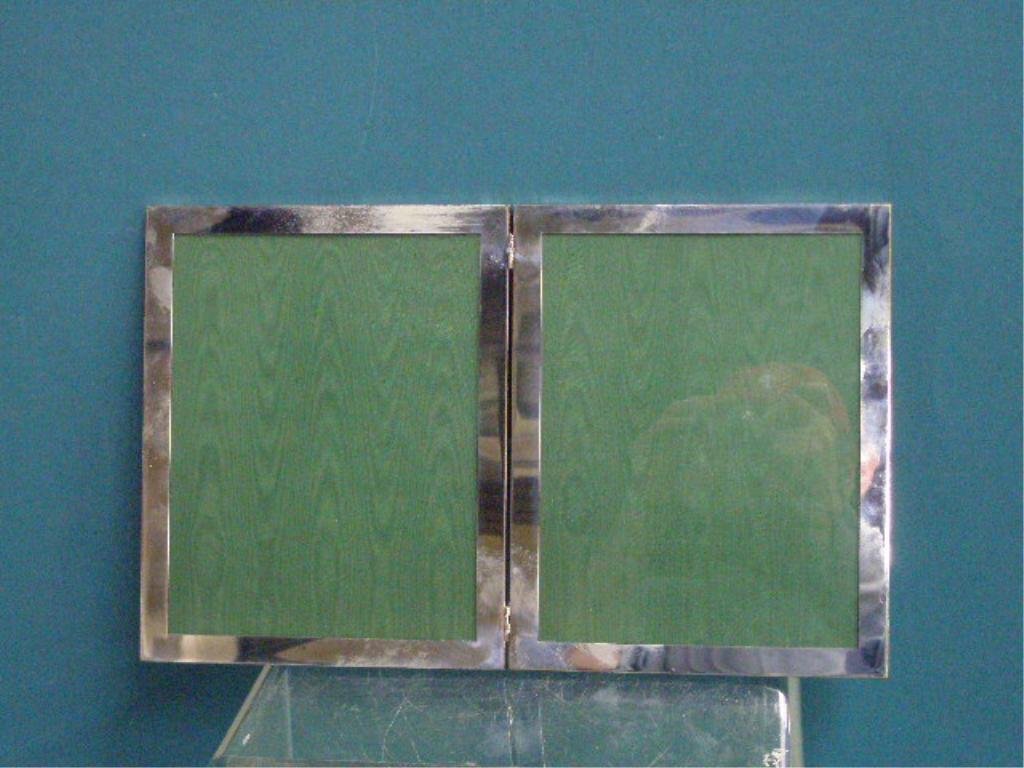 Sterling Silver Picture Frame: Webb sterling silver double sided 16 1/4" x 10 1/4" picture frame. CONDITION: Very good with minor wear.