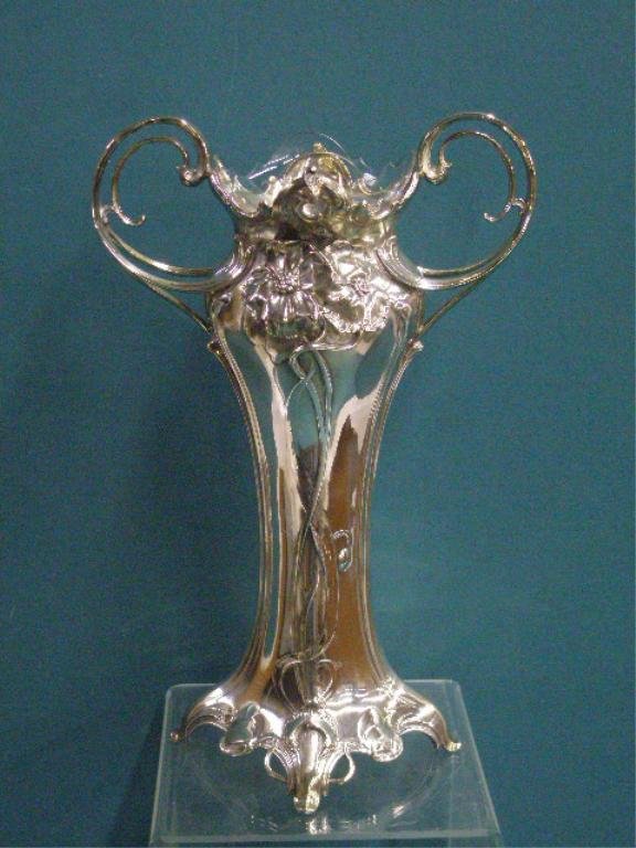 Art Nouveau Silverplate Vase: Art Nouveau silverplate 15 1/2" x 10 1/2" double handled vase with crystal glass insert, applied floral rosettes on both sides that adjoin relief floral stem designs, there are the following marks on 