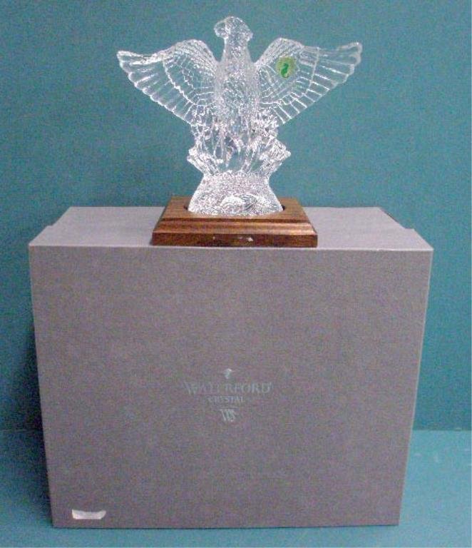 Waterford Phoenix Bird Figurine: Waterford crystal Legends & Lore Collection 6 1/2" x 8" Phoenix Bird figurine on wood base with box. CONDITION: Very good with no damage, box has wear.