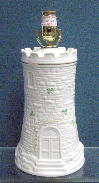 Belleek Porcelain Lamp: Belleek porcelain 10" Castle Tower lamp. CONDITION: Works, very good with no damage.