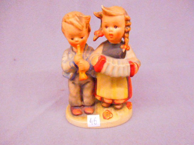 Hummel Figure "Birthday Serenade": Hummel porcelain figure, "Birthday Serenade" #218 2/0 (Old Style) MK-4, 4 1/2" h. CONDITION: Minor wear at girl's hair tip.