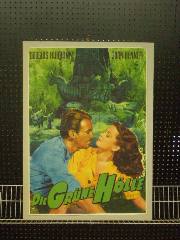 1940 "Green Hell" German Movie Poster: 1940 "Green Hell" German titled ("Die Grune Holle") 33' x 23 1/4" movie poster, 35" x 25" overall size mounted on poster board. CONDITION: Fold lines, loss on both top corners, wear.