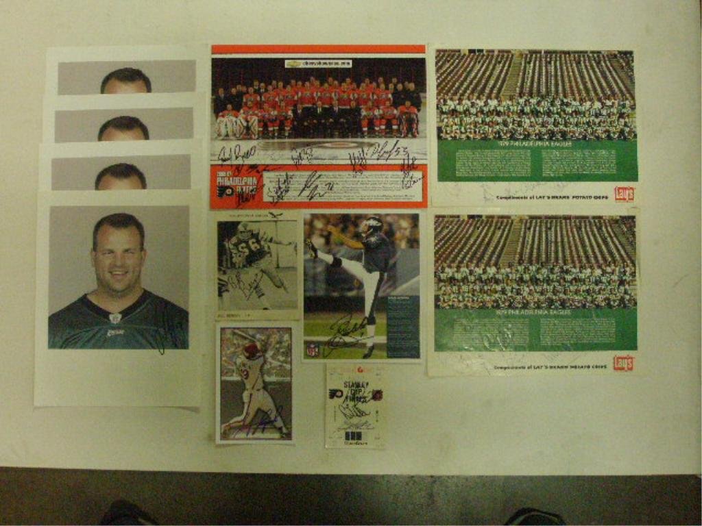 Phila Sports Team Signed Items: Lot of assorted Philadelphia Eagles, Flyers & Phillies signed items, no C.O.A. for authenticity or guarantee of signatures being real. CONDITION: All have some form of wear.