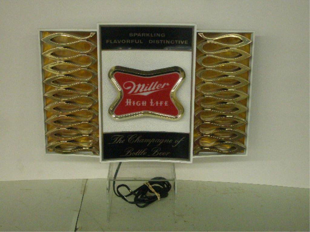 Miller High Life Lighted Sign: Miller High Life plastic lighted sign; 50's style side panel decoration, "Sparkling, Flavorful, Distinctive", The Champion of Bottled Beer.