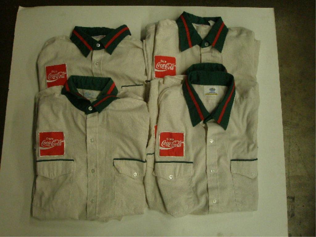 Coca-Cola Uniform Shirts: (8) Coca-Cola delivery uniform shirts: most M (16-16 1/2") (1) (17-17 1/2), short sleeve. CONDITION: Minor wear.