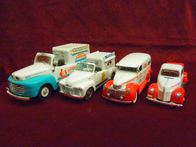 Four 1930's-1950's Delivery Trucks: Lot of four 1930's - 1950's Delivery Trucks: (1) 1948 Ford Ice Cream Truck by Road Legends, (1) 1953 Good Humor Truck from the Danbury Mint, (1) 1940's Heinz Truck from the Danbury Mint, (1) 1930's Pe