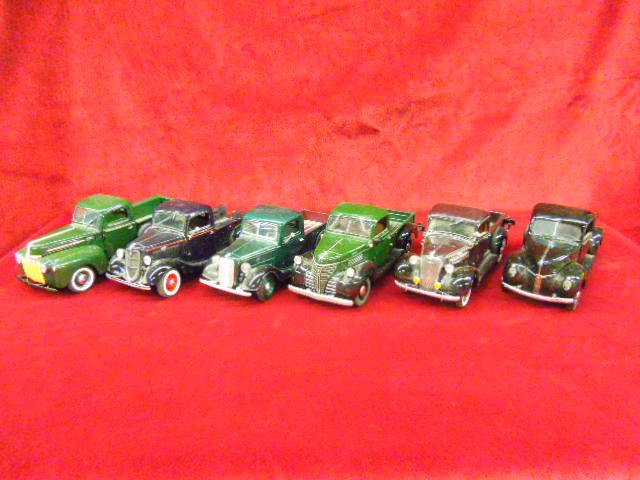 6 Die Cast Trucks: Lot of 6 1930's - 1940's Die Cast pick up trucks; 1942 Ford, 1935 Ford, 1937 Chrysler 1941Plymouth From The Danbury Mint, 1940 Ford From The Franklin Mint, & 1937 Ford made in China. CONDITION: Some w