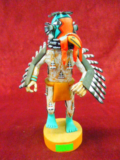 Hopi Kachina Doll "Turkey": Contemporary S.W. Hopi Kachina doll; "Turkey", artist signed, "Wm. James", hand carved, polychromed hand painted figure, winged arms & tail. CONDITION: No issues identified.