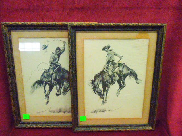 2 Remington Prints: Two Frederic Remington prints, in black & white, bronco busters, carved & gilt frames, early 20th C. CONDITION: Slight foxing, frames with paint loss.