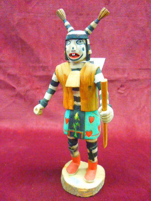 Hopi Kochina Doll "Clown": Contemporary S.W. Hopi Kachina doll; "Clown" (Hano / Polacca) with spear, artist signed "Karen Komarestewa, hand carved, polychrome hand painted, 11 3/4" h. CONDITION: Top horns reglued, right leg fea