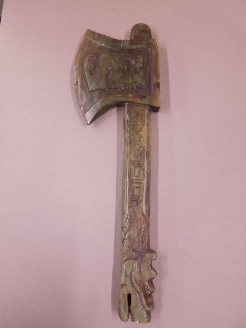 Chinese Soapstone Ax Carving: Chinese soapstone ax carving, with dragon handle, green to brown, 20th C., length 12 1/4". CONDITION: No issued identified.