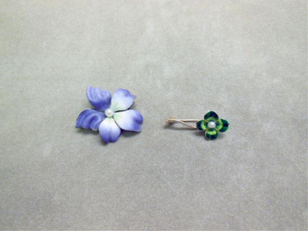 2 Art Nouveau 14k enameled pins: 2 Art Nouveau 14k enameled pins, 4 leaf clover with 3mm Baroque pearl, minor enamel loss on white tip. Both marked 14k. 4.4DWT total. CONDITION: Very good, orchid has minor enamel loss on white tip.