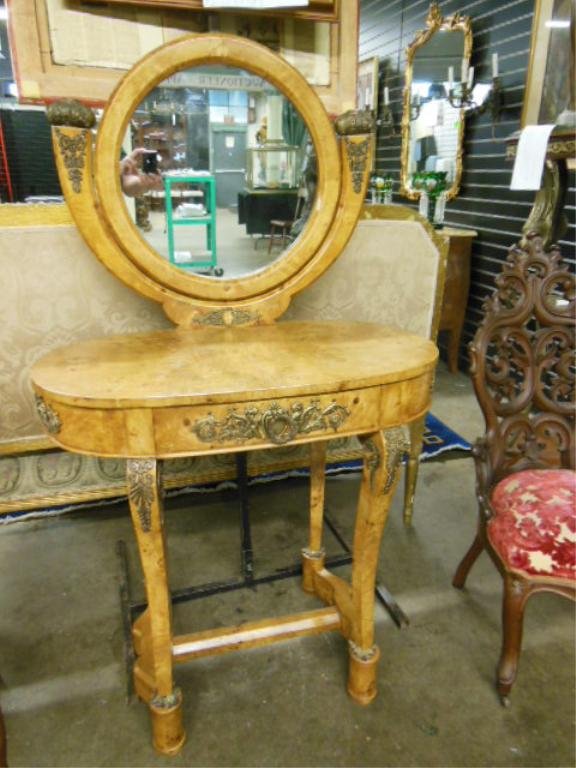 Russian Empire-Style Lady's Dressing Table: Russian Empire-style Karelian birch and ormolou mount Lady's dressing table, Continental, 20th c. 54" = h 32 1/4" = w 17 1/2" = d CONDITION: No issues identified.