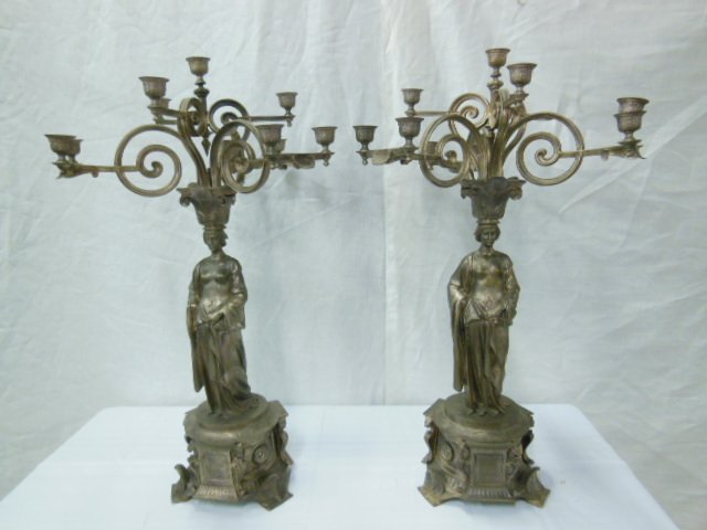 Pr Silvered Bronze Candelabra: Pair of silvered bronze candelabra, classical sculptured female maidens on a lion, shell and rosette cast plinth, 10 light, 19th C., [17] 31 7/8" CONDITION: two candle cup knobs on one candelabrum rep