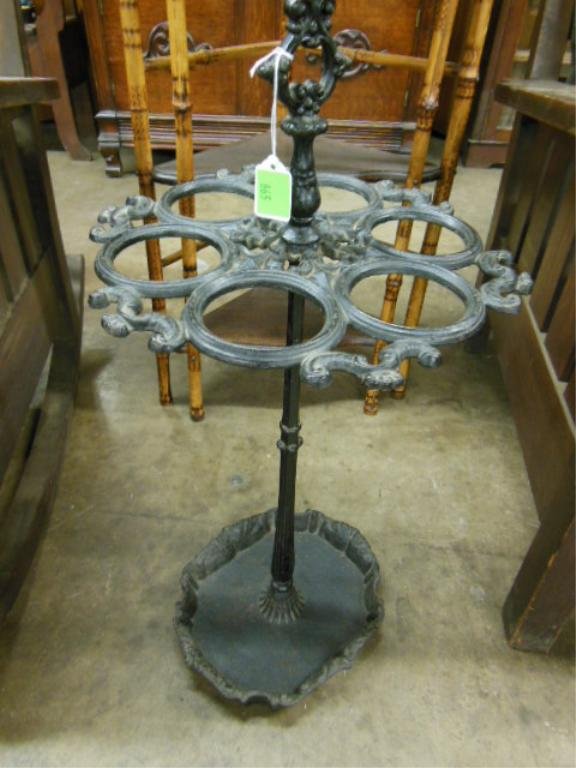 Victorian Cast Iron Cane/Umbrella Stand: Victorian cast iron cane / umbrella stand, ring and scroll work motifs, late 19th C. CONDITION: No issues identified.