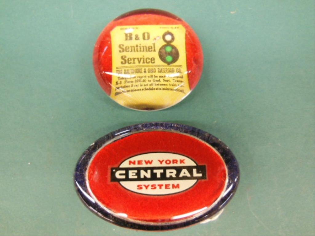 N.Y.C. System and B&O glass paperweights: N.Y.C. System and B&O glass paperweights.