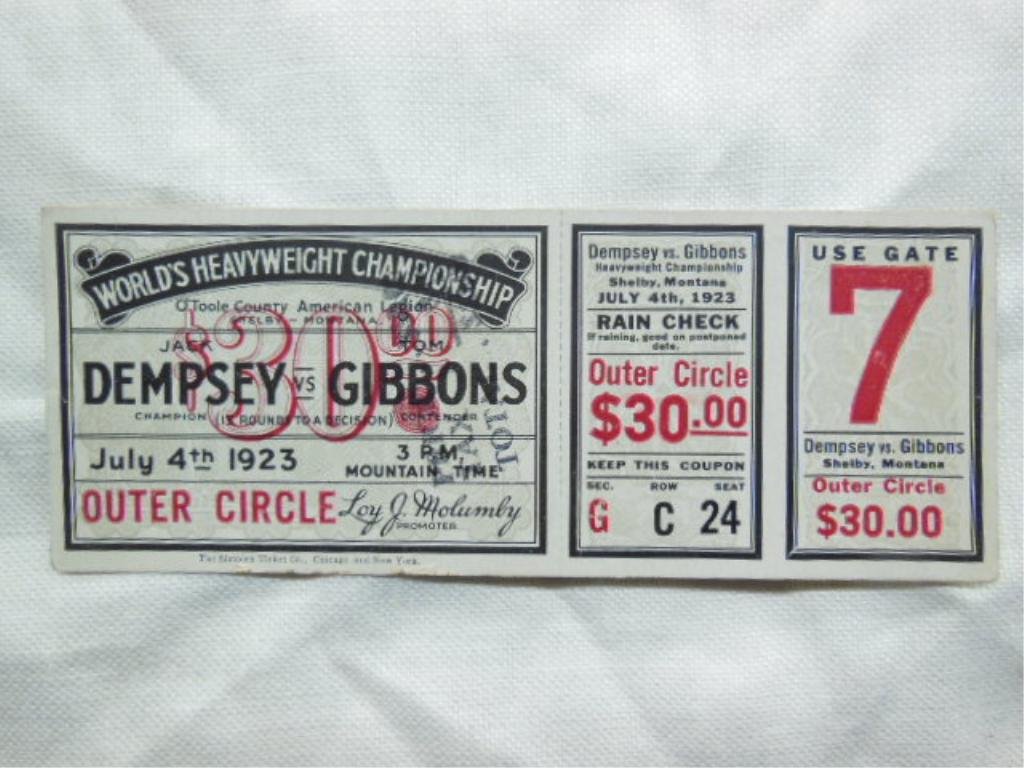 1923 Boxing Ticket: July 4, 1923 boxing ticket - World Heavyweight Championship, Jack Dempsey vs. Tom Gibbons, O'Toole Country American Legion sec: G, row: C., seat: 24 (outer circle). CONDITION: Some wear (edges) from a