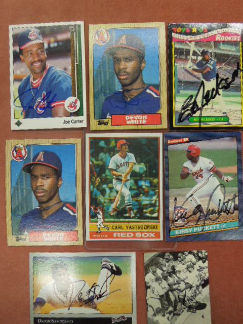 (7) Signed Baseball Cards: (7) Signed Baseball Cards including; Deion Sanders, Kirby Pickett, Bo Jackson, Devon White (2), Joe Carter and Carl Yastrzemski, plus a Roy Campanella Magazine cut out photo. CONDITION: Fair to good.
