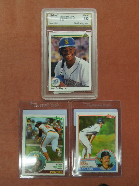 3 Baseball Cards: 3 baseball cards, includes: Ken Griffey Jr. 1990 Upper Deck Card graded 10 by Mint Grading Co; Tony Gioynn Topps 1982 cards; Wade Boggs Topps 1982 cards. CONDITION: No issues noted.