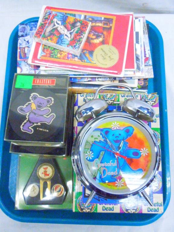 Lot of Grateful Dead Collectibles: Lot of Grateful Dead Collectibles Including: Alarm clock, coasters, holiday cards, book, golf marker set. Condition: good