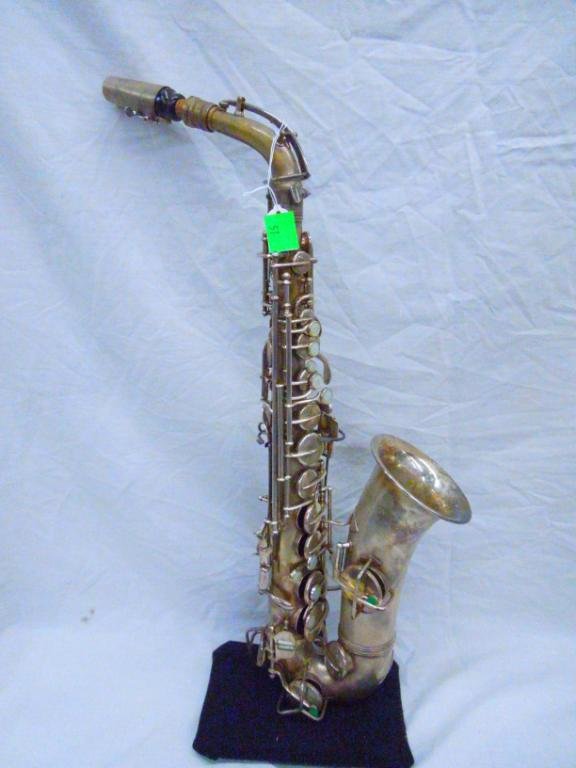 C.G. Conn Saxophone Elkhart Ind. SER# M236749: C.G. Conn Alto Saxophone Elkhart Ind. SER# M236749 circa 1969, silver plated with case. Condition: Fair, shows finish loss, worn pads.