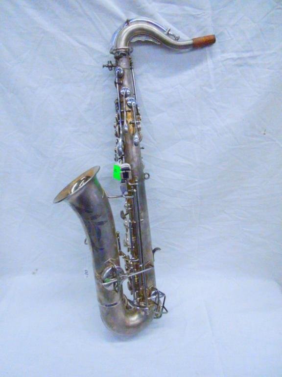 Buescher Tenor Saxophone SER#233830: Buescher Tenor low pitch Saxophone SER#233830 circa 1927-28, silver plated with case. Condition: Godd showing age and some finish loss.