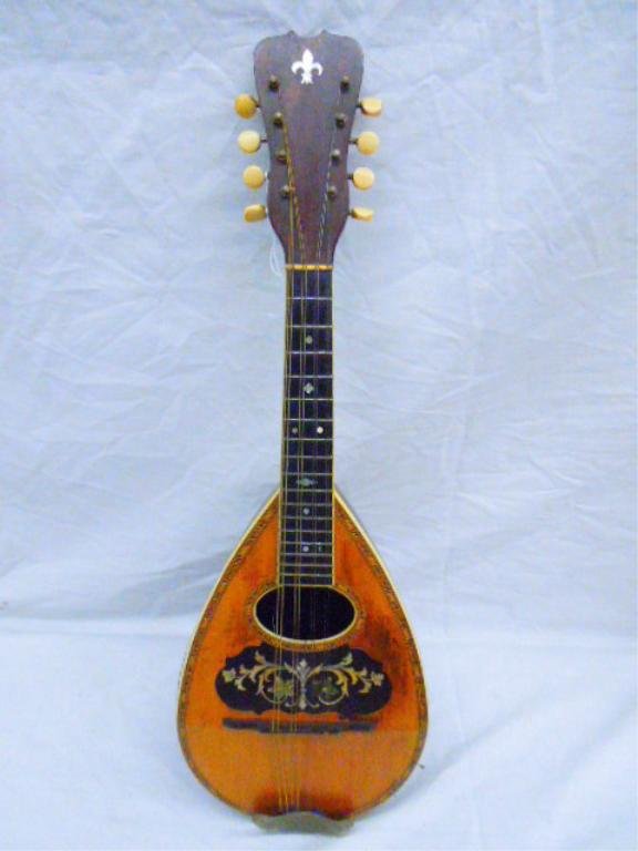 Carl Fischer Florence 8-String Mandolin: Carl Fischer Florence 8-String Mandolin. Condition: Good with small crack on front.