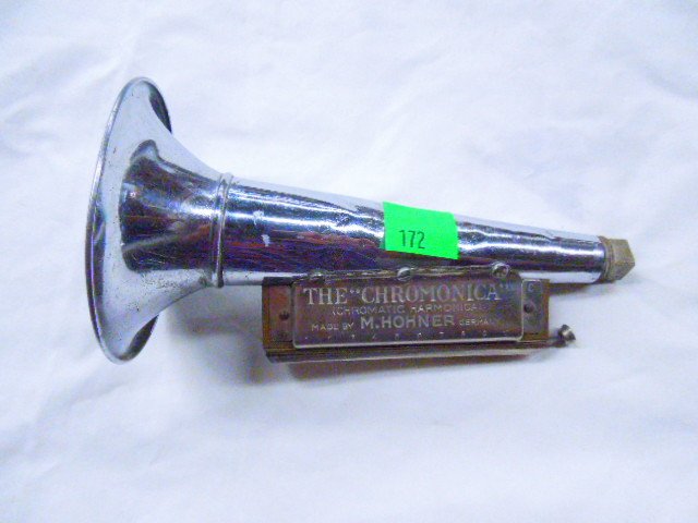 M.Hohner Chromatic Harmonica With Made Up Horn: M.Hohner Chromatic Harmonica With Made Up Horn. Condition: Interesting... Someone screwed the harmonica to a horn which has dents.