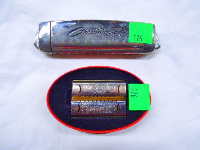 M.Hohner Puck & Chromonica II Harmonicas: M.Hohner Puck & Chromonica II Harmonicas. The puck is in the keys of C&G, The Chromonica is in the key of C. Condition: Good used for the Puck, The Chromonica is fair with a loose end.