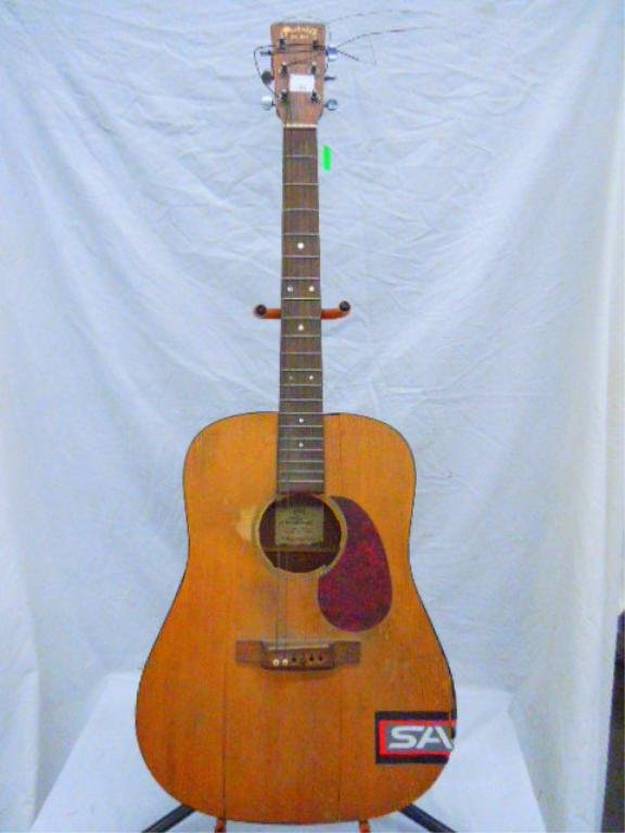 Martin DM Dreadnought Guitar: Martin DM Dreadnought Guitar SER# 610920 Measures: 15.5" wide, 19.77" tall, with a tapered depth 4" at top and 4.75" at bottom. CONDITION: Poor- Needs total restoration. No case.